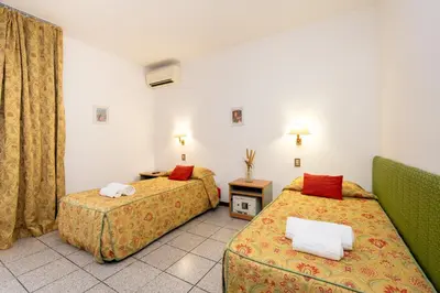 Letto o letti in una camera di Camelia Rooms Venice Guesthouse