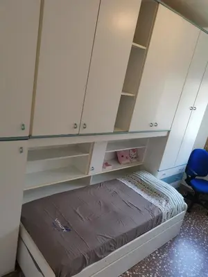 Letto o letti in una camera di CASA CATERINA