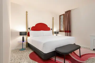 Letto o letti in una camera di Palazzo Dei Fiori by Room Mate