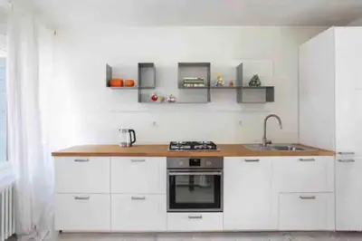 Cucina o angolo cottura di Amadeus Apartment: a due passi dal Duomo