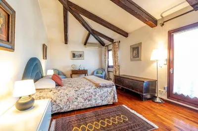 Letto o letti in una camera di Palazzo Gradenigo by Wonderful Italy
