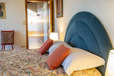 Letto o letti in una camera di Palazzo Gradenigo by Wonderful Italy