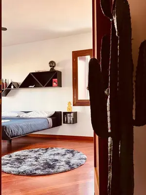 Letto o letti in una camera di Wow House - Ampia Villa con Piscina e sala giochi