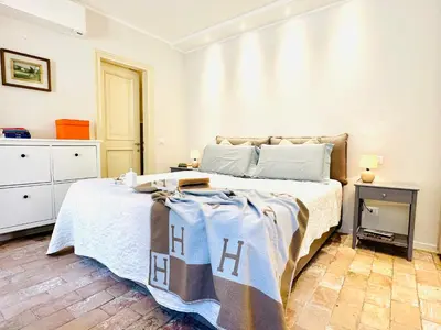 Letto o letti in una camera di Ca' Degli Uberti Dimora Storica