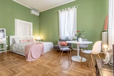 Letto o letti in una camera di Studio liberty a 100 metri dalle mura