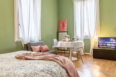 Letto o letti in una camera di Studio liberty a 100 metri dalle mura