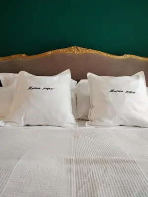 Letto o letti in una camera di Maison Papà, una casa per sentirsi a casa.