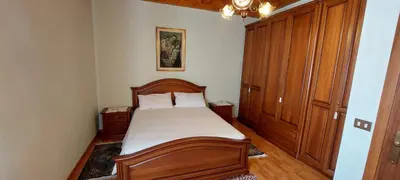 Letto o letti in una camera di Casa Rosa