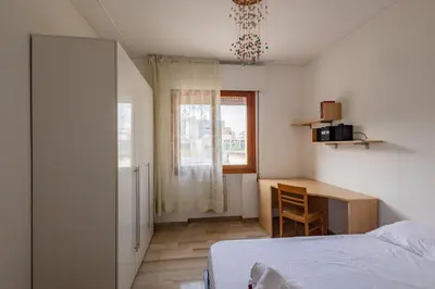 Letto o letti in una camera di GuestHost - Kris- Mestre Bright Apartment with Parking!