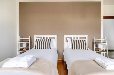 Letto o letti in una camera di Agriturismo Alla Vigna