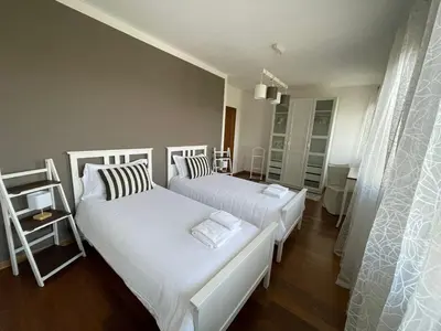Letto o letti in una camera di Agriturismo Alla Vigna