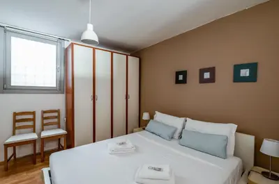 Letto o letti in una camera di GuestHost - Padova - Piazza dei Signori Central Flats