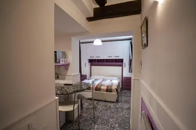Letto o letti in una camera di San Polo Studio