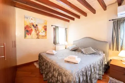 Letto o letti in una camera di San Marco Apartments