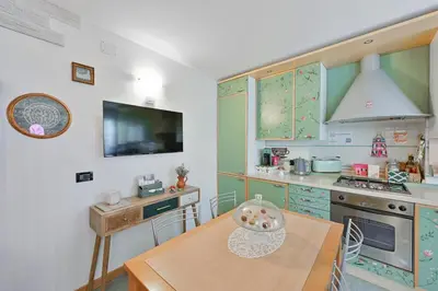 Cucina o angolo cottura di Flora Cottage Guesthouse Burano