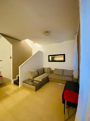 Area soggiorno di Central Luxury Garden guest house
