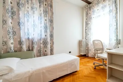 Letto o letti in una camera di enJoy Home - Villa Appiani, Prato della Valle