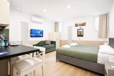 Letto o letti in una camera di Suite Della Corte Apartment