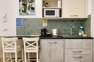 Cucina o angolo cottura di Suite Della Corte Apartment