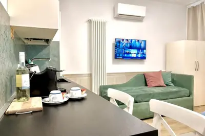 TV o dispositivi per l'intrattenimento presso Suite Della Corte Apartment