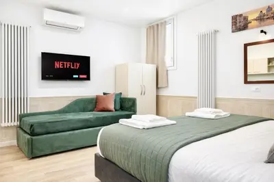 Letto o letti in una camera di Suite Della Corte Apartment