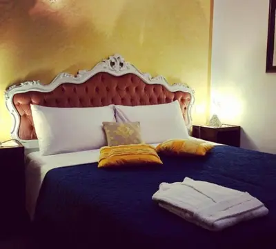 Letto o letti in una camera di CA' DI LUNA VENEZIA