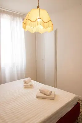 Letto o letti in una camera di Sweet Balcony - Campo S.Giacomo dell'Orio