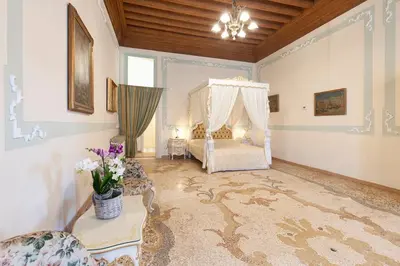 Letto o letti in una camera di LUXURY APARTMENT PESARO PAPAFAVA