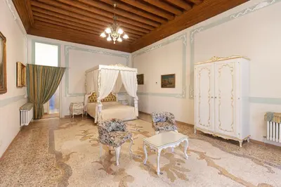 Letto o letti in una camera di LUXURY APARTMENT PESARO PAPAFAVA