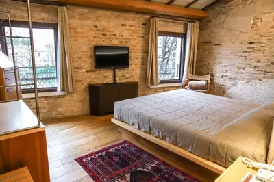 Letto o letti in una camera di Locanda Ponte Dante