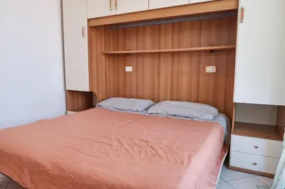 Letto o letti in una camera di Poolside escape in Rosolina-Beahost