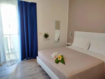 Letto o letti in una camera di Hotel Madera