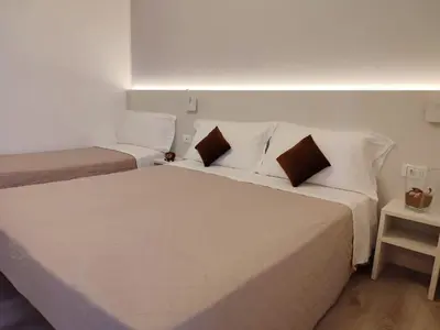 Letto o letti in una camera di Hotel Madera
