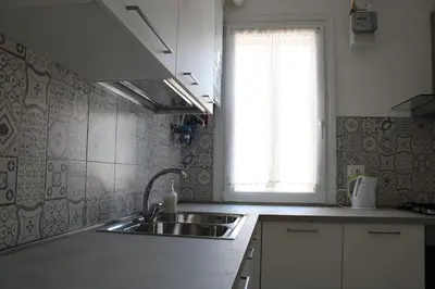 Cucina o angolo cottura di Apartment with terrace in Chioggia's main square