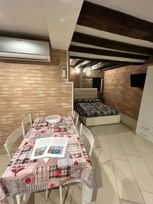Letto o letti in una camera di Venezia Holiday