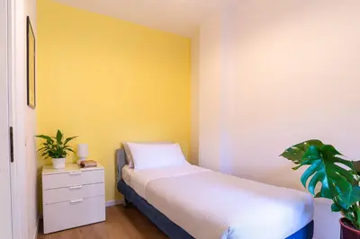 Letto o letti in una camera di Giustiniani Apartments