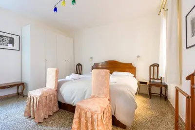 Letto o letti in una camera di Fondamenta della Misericordia by Bealux Srl