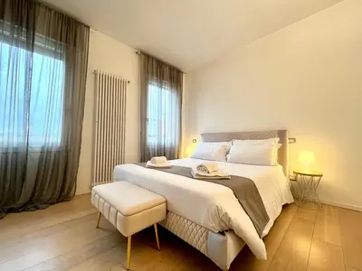 Letto o letti in una camera di Appartamento Fusinato - Relax in centro