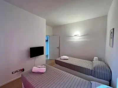 Letto o letti in una camera di Appartamento Fusinato - Relax in centro