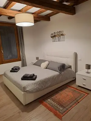 Letto o letti in una camera di Appartamento Giglio