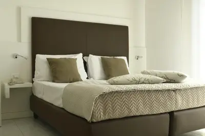Letto o letti in una camera di Hotel El Salvador Frontemare Piscina Riscaldata