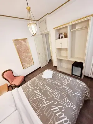Letto o letti in una camera di Ca'Briani Luxury - Behind S.Mark Square