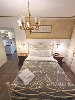 Letto o letti in una camera di Ca'Briani Luxury - Behind S.Mark Square