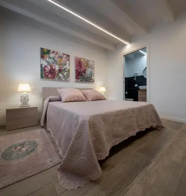 Letto o letti in una camera di Camerini Guest House