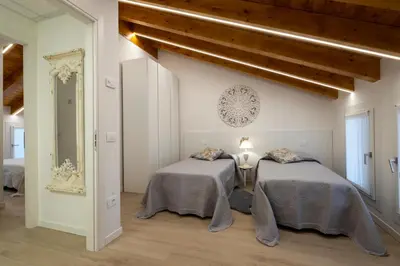 Letto o letti in una camera di Camerini Guest House