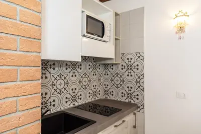 Cucina o angolo cottura di Con giardino privato, in centro, vicino stazione