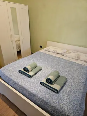 Letto o letti in una camera di Camera Matrimoniale