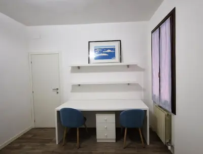 Letto o letti in una camera di Ca' Fontego