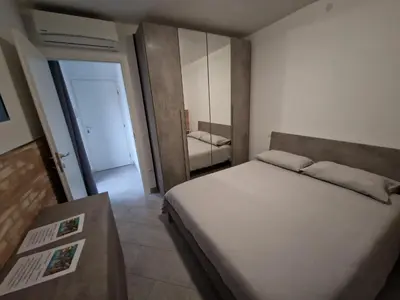 Letto o letti in una camera di Chioggia in Terrazza