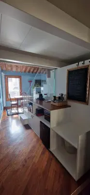 TV o dispositivi per l'intrattenimento presso Elegante alloggio in casa storica-Borgo Portello
